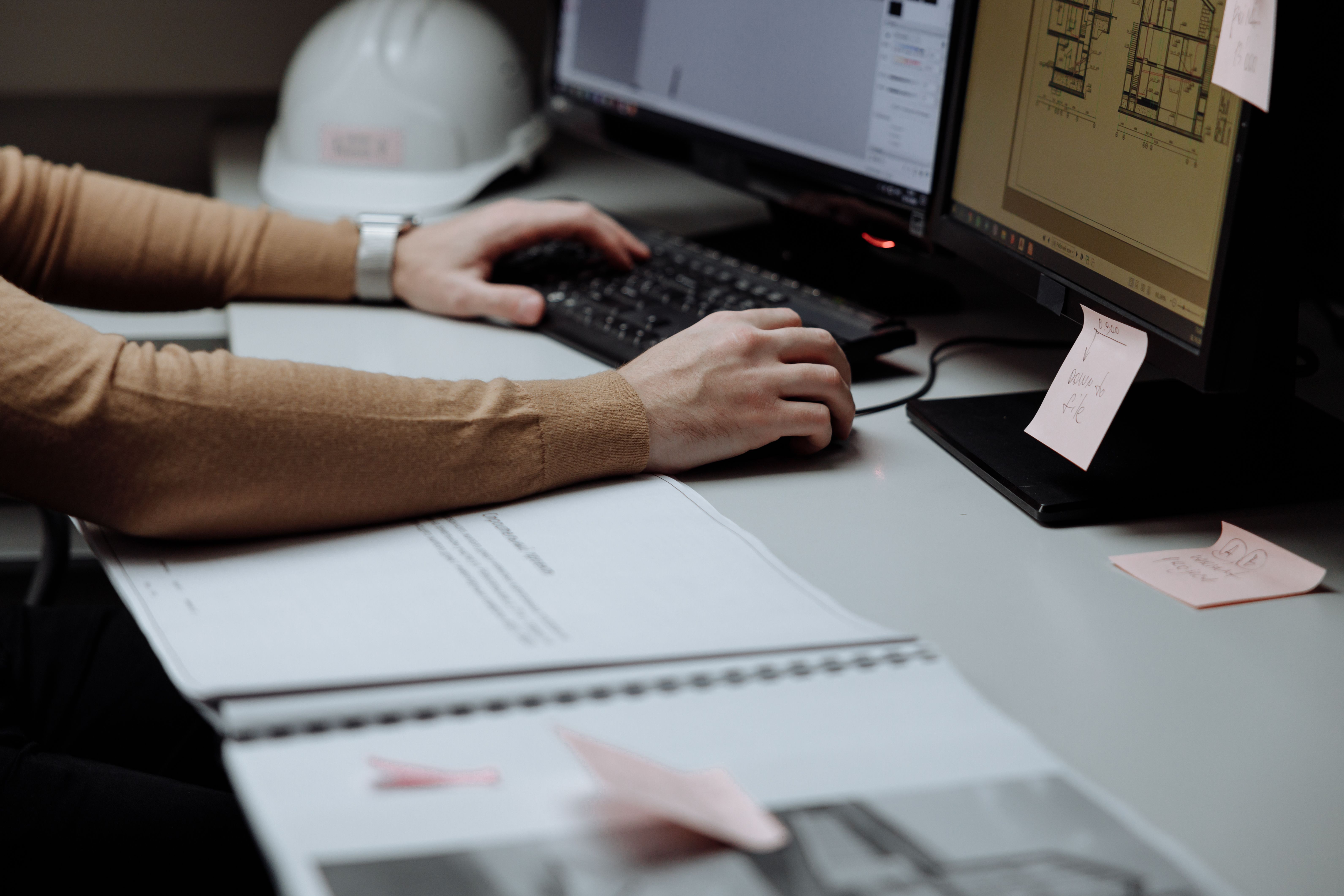 Professional design planning with architectural drawings and blueprints
